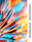 Small photo of Background with bright multi-colored feathers in native american indian chief headdress. Horizontal or vertical eye-catching banner with colourful blue, orange and red feathers. Copy space for text