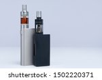 stock-photo-two-vapes-on-a-white-background-the-concept-of-vaping-vape-shop-smoking-electronic-cigarettes-1502220371.jpg