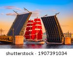 Saint Petersburg. Russia. A ship with scarlet sails passes under the Palace bridge. White nights in Saint Petersburg. Holiday Scarlet sails. The sailing ship on the Neva. Bridges Of St. Petersburg.
