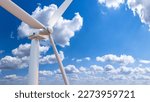 Small photo of Wind generator. Sustainable energy. Windmill on background to sky. Fragment of wind turbine. Windmill on sunny day. Wind electro station. Caring for ecology. Renewable energy. Generator affiliate