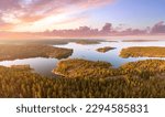 Small photo of Karelian isthmus. Lakes of Russia. Ladoga aerial view. Forests of Karelia. Ladoga lake. Coniferous nature. Landscape of Russian taiga. Republic Karelia. Sunset over forest. Karelia in summer evening