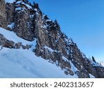 Small photo of A sunny winter day in the Teton Mountain Range. The Teton Range is a mountain range of the Rocky Mountains in North America. One theory says the early French voyageurs named the range les trois tetons