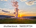 Old Faithful Geyser Eruption in Yellowstone National Park at Sunset