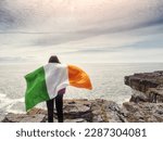 Person holding national flag of ...