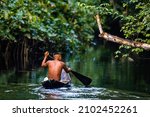 Native Tribal Man Swimming In...