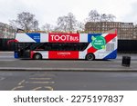 Small photo of London, UK - February 10, 2023: Toot bus, a hop on, hop off tour bus seen on Piccadilly in London
