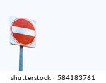 A square red sign with a white bar indicating 'NO ENTRY' on a grey metal post against white background.