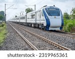 Small photo of Pune, India - June 18 2023: The Solapur Mumbai Vande Bharat Express Train heading towards Mumbai, shot at Uruli near Pune India.