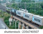 Small photo of Daund, India - September 03 2023: Container train hauled by a WAG 9 electric locomotive at Daund India.