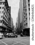 Small photo of Hong Kong, Hong Kong, China - March 14 2018: glimps of the street of central Hong Kong, seeing tall block of flats and a junction