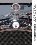 Small photo of Sparkford.Somerset.United Kingdom.March 26th 2023.Close up of the badge and bonnet ornament on a 1928 Jordan Playboy Special at the Haynes Motor Museum in Someset