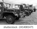 Small photo of Low Ham.Somerset.United Kingdom.July 23rd 2023.A row of military trucks including a Mack M52 and a Scammell Pioneer are on show at the Somerset steam and country show