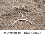 Cigarette Butts On The Beach....