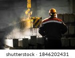 A male worker controls the...
