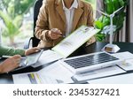 Small photo of Solar panels green energy Business people working in green eco friendly office business meeting creative ideas for business eco friendly professional teaching corporate people sustainable electricity