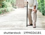 Elderly Woman Standing On The...