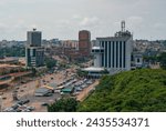 Small photo of YAOUNDE, CAMEROON - June 6, 2022: View of 20 Mai Boulevard with Cameroon Telecommunications (CAMTEL) building on the right.