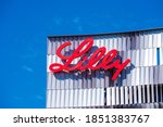 Eli lilly logo sign atop lilly...