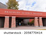 Small photo of Bradbury Science Museum sign on the exterior of chief public facility of Los Alamos National Laboratory - Los Alamos, New Mexico, USA - 2021