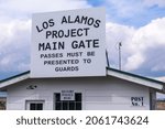 Small photo of Los Alamos Project Main Gate sign on historic building - Los Alamos, New Mexico, USA - 2021