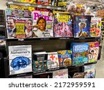 Small photo of Sacramento, CA, USA June 28th, 2022 Magazines and tabloids for sale at a local supermarket