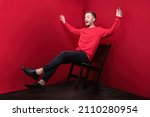 Small photo of misadventure shows fall from chair with hands wide open looks like he is flying while his face shows surprised expression