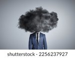 Person with a dark cloud over the head