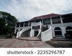 Small photo of Palembang, Indonesia - June 2019 : Curved front steps at the entrance of Sultan Mahmud Badaruddin II Museum, a place to explore History of Palembang. It is located on the riverbank of the Musi.
