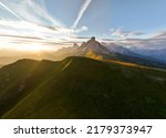 View from above, stunning aerial view of the Giau pass during a beautiful sunset. The Giau Pass is a high mountain pass in the Dolomites in the province of Belluno, Italy.