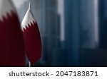 small flags of qatar on a... | Shutterstock . vector #2047183871