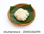 Sticky rice in bamboo basket on white background. 