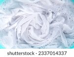 Small photo of Soak a cloth before washing, white cloth
