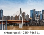 Looking at the tall buildings of the city from the Yangtze River bank in Chongqing