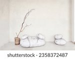 Small photo of Stone podiums for various goods on a gray background. A place to copy. Minimalistic scene of recumbent stones. High quality photo