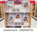 Small photo of San Diego, CA - October 31, 2023: Tangerine vinyl edition and CD editions of 1989 Taylor's version for sale in target stores.