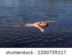 Small photo of drowned man, floating body of a drowned person