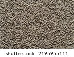 Small photo of Animal feed mixed from finely ground protein powders of both plants and animals is pelleted to be used as pet food because pellets are convenient and accurate in feeding quantity.Copy Space background