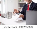 Small photo of Real estate agents are selling real estate clients and offering condominiums buyers as long term rental investments help reduce burden paying installments. Investment property trading long term rental