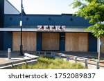 Small photo of Kirkland, Washington / USA - June 1 2020: Boarded up Zeeks Pizza restaurant in anticipation of police brutality protests