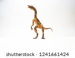 Small photo of Compsognathus Dinosaur on white background .