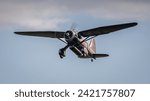 Small photo of old Warden, UK - 2nd October 2022: Vintage aircraft Westland Lysander in flight flying low over airfield