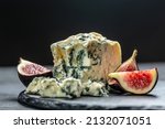 Small photo of blue cheese and sweet fruit figs. blue cheese gorgonzola picante with blue mold from north of Italy. Food recipe background. Close up.