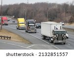Small photo of Germantown, Maryland, USA - March 6, 2022: Truckers from the "People's Convoy" drive down Interstate 270 on their way to the Washington, D.C. Beltway to protest vaccine mandates.