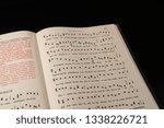 Small photo of Echternach / Luxembourg - 03 10 2019: Catholic liturgical book with gregorian chant in Latin. The extraordinary rite.