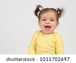 Laughing Baby Girl In Yellow...