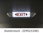 Emergency exit sign inside an airplane