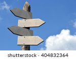 Wooden signpost with four...
