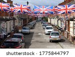 Union Jack Flags Hang Over A...