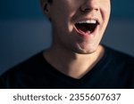 Sing, talk or speak. Singer mouth open. Man with loud sound of voice. Pronunciation in language education, articulation exercise or vocal lesson. Song in music studio. Speech or karaoke. Yell or shout