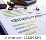 Small photo of Contingency planning is shown using a text and picture of charts and graphs